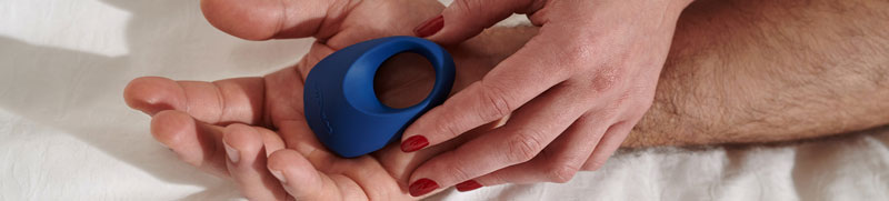 an image of a couple holding vibrating cock ring