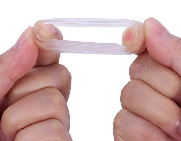 an image of a woman stretching a cock-ring