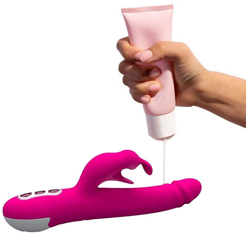 A person using lube with a vibrator