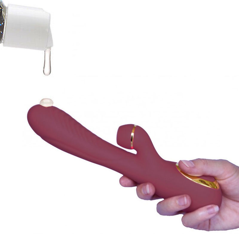 A person using lube for penetration with a vibrator